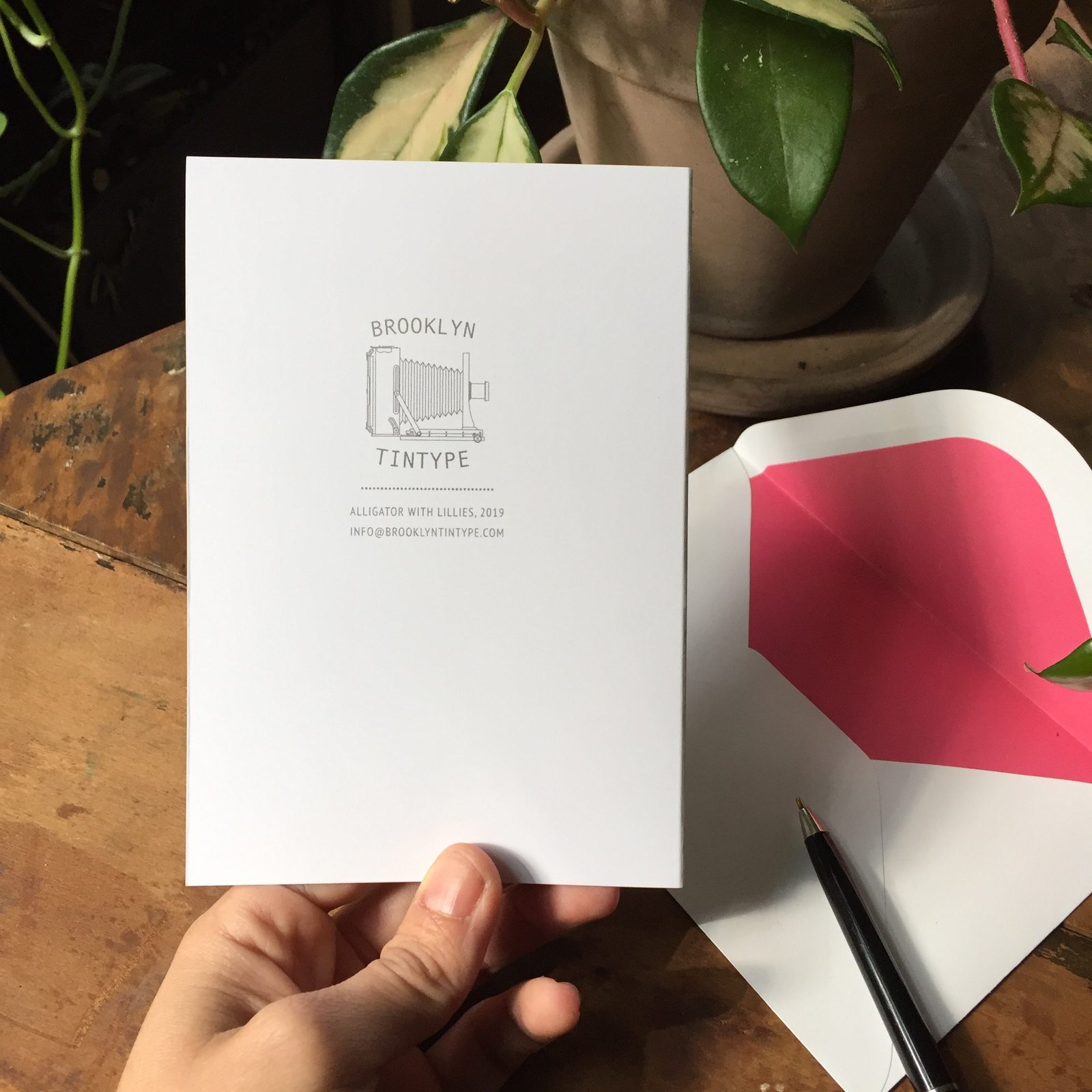 The back side of a blank notecard with Brooklyn Tintype Logo